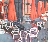 Sidewalk umbrellas and chairs